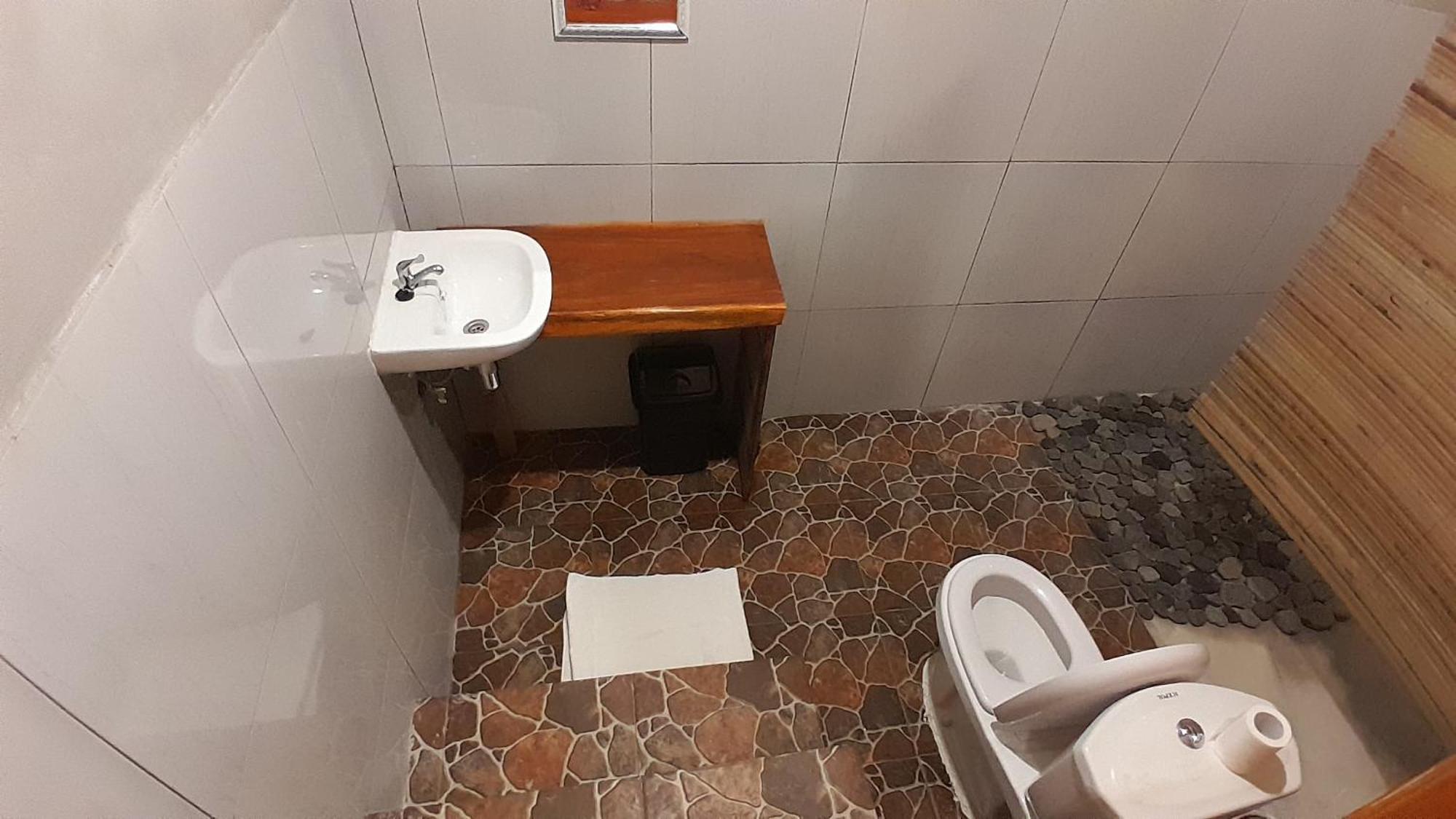 Bayan Exotic Homestay Сенару Екстер'єр фото